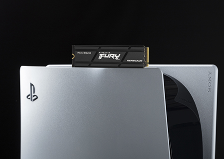 A Kingston FURY Renegade SSD installed in a PlayStation5’s uncovered internal SSD slot.