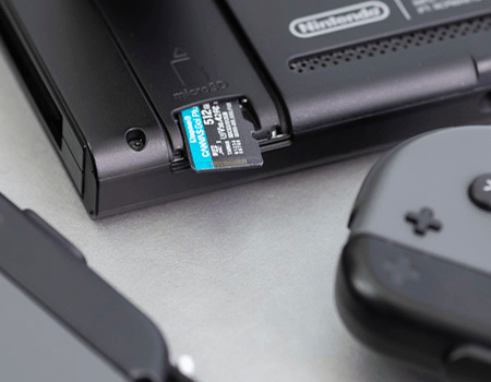 Kingston Go! Plus microSD with a Nintendo Switch on a desk
