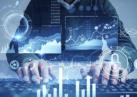 A man’s hands typing on a keyboard at a blurry table with double exposure of immersive HUD infographic interface