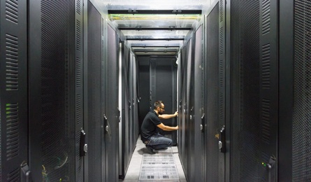 Man working in a server room