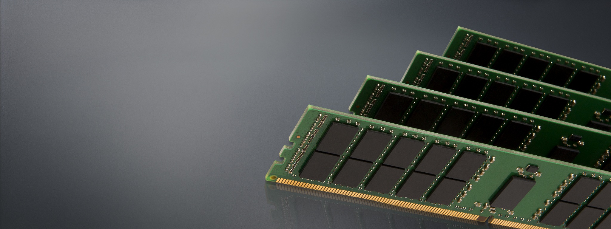 Kingston memory modules on a gray background with a reflection beneath it