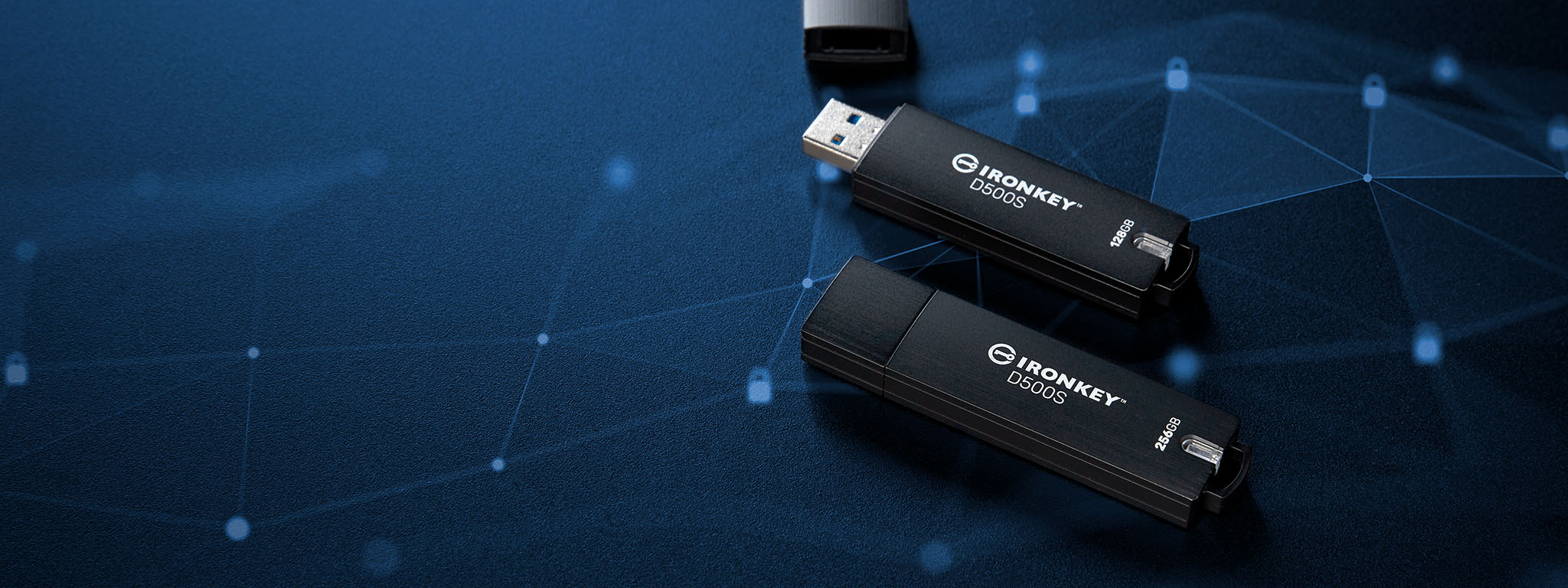 A pair of IronKey D500S USB flash drives sit on a black surface with lock icon graphics in blue