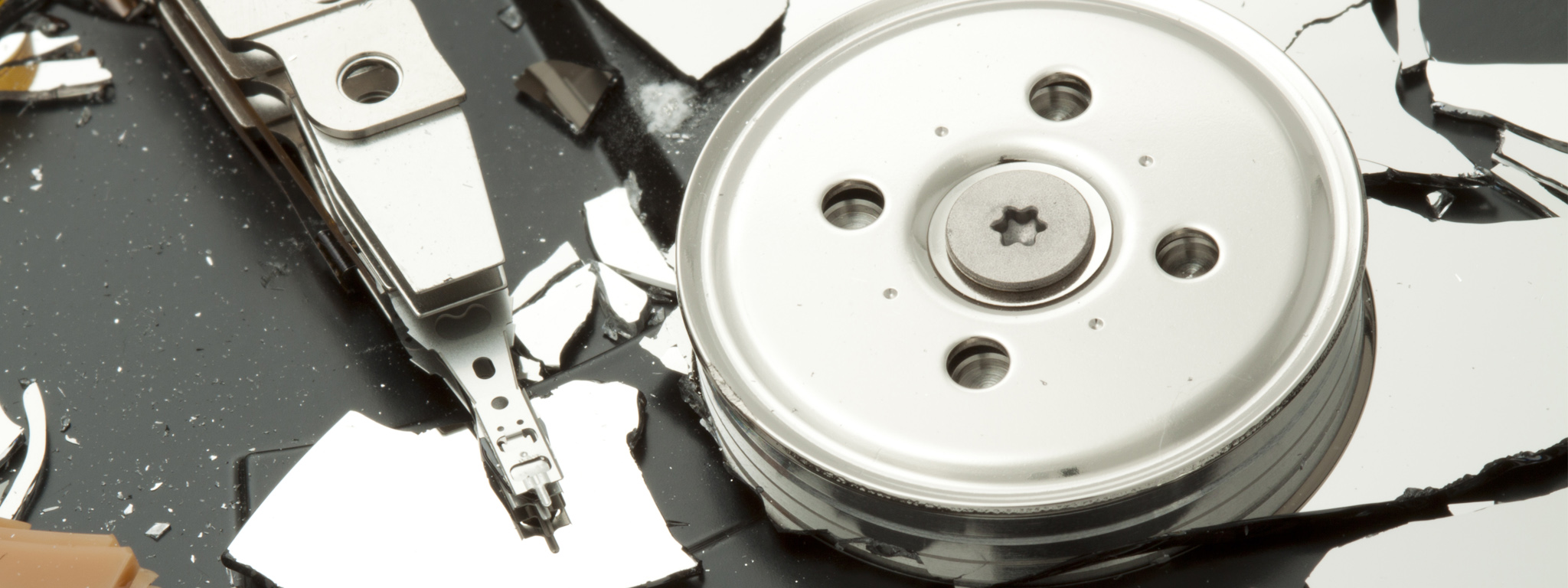 A broken hard drive platter.