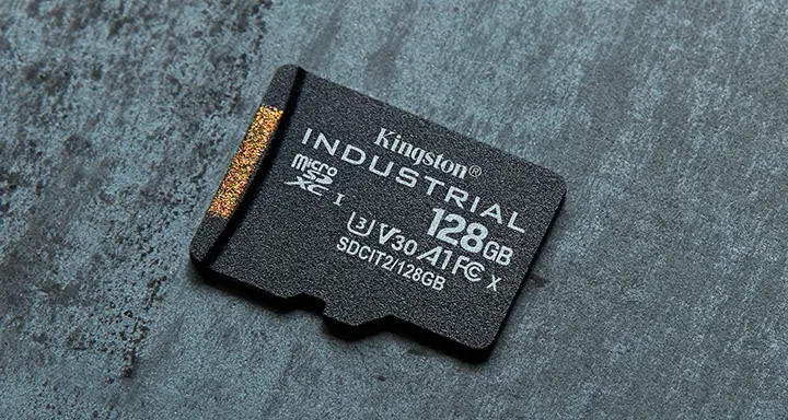 Kingston Industrial microSD card sits on a gray surface.