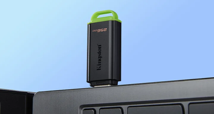 A DataTraveler Exodia USB flash drive connected to a laptop.