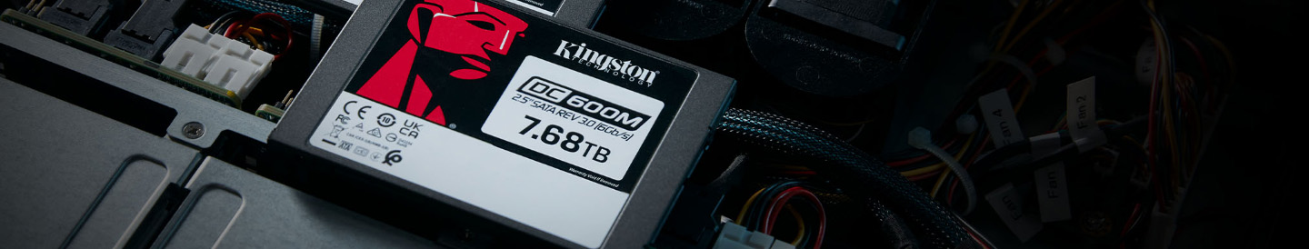 Full width image of Kingston SSD on top of computer hardware