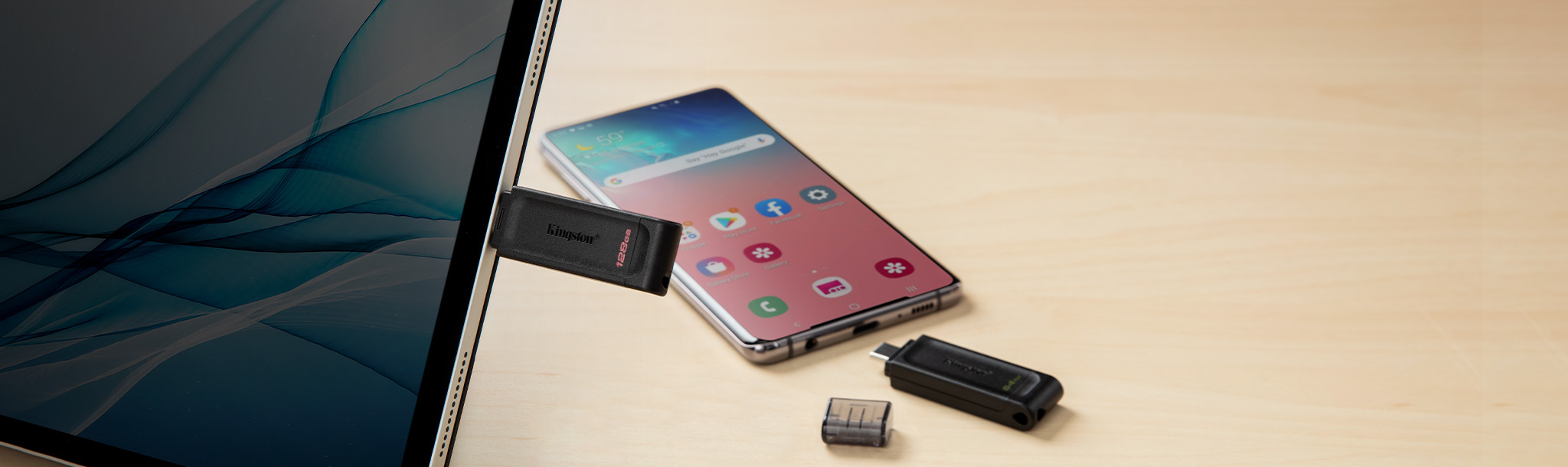 Зображення DT70 із планшетом і телефоном, обладнаними роз’ємом USB-C