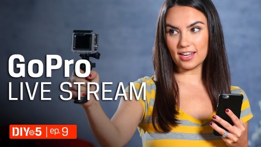 Trisha holding a GoPro and an iPhone.