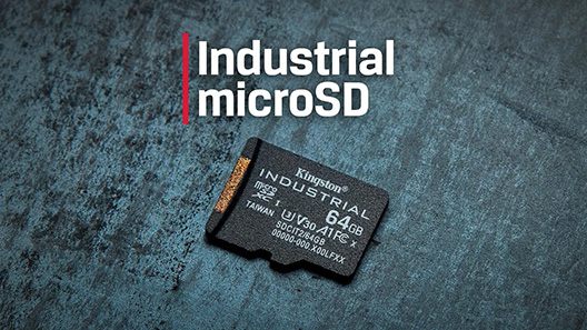 A Kingston Industrial microSD card with 64GB of capacity lies on a hard surface.
