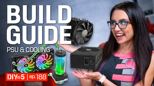 Trisha holding a mini fan in front of a gaming PC