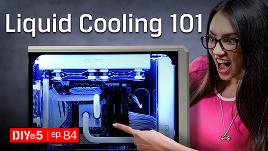 Trisha pointing at a cooling system in a PC