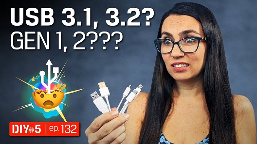 Trisha looking confused at the many types of USB connectors she is holding.