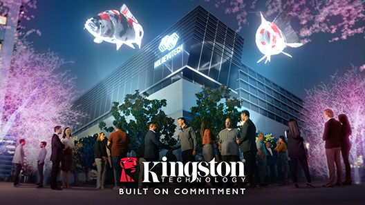 Một văn phòng kinh doanh công nghệ với các nhân viên đang ăn mừng cam kết của Kingston.