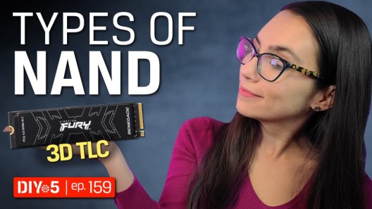 Trisha holding and looking at a FURY Renegade SSD