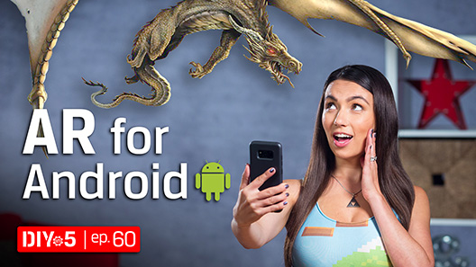 Trisha che tiene in mano uno smartphone mentre un dragone realizzato con la tecnologia della realtà aumentata fluttua in aria